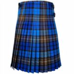 A blue, brown, and black tartan kilt is displayed against a white background. It features pleats and two leather buckles, evoking a traditional and formal tone.